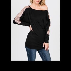 Rose colored sequined sleeves